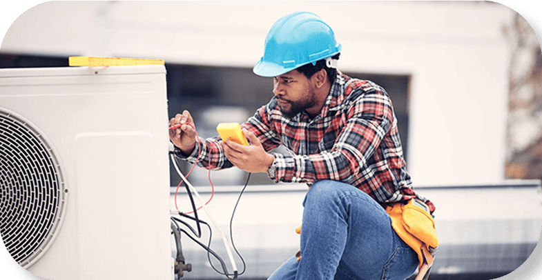 HVAC Technician working on outdoor unit